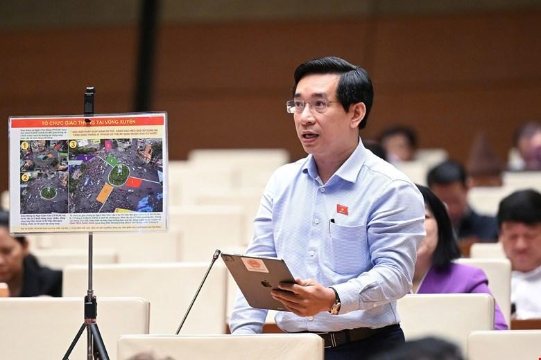 Hinh anh ve gio cao diem tai Vong xoay Go Dau, Thu Dau Mot, Binh Duong cho thay su un tac giao thong